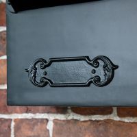 Close up of matching filigree name plate