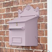Savannah Sunset Pink Goldhay Secure Post and Parcel Box on brick wall