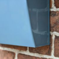 Close up of post box framework and colour 