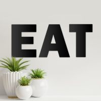 Black Metal Letters spelling "EAT"