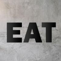 Black Metal Letters spelling "EAT"