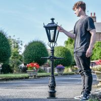 Black Miniature Dorchester Lantern with Male for scale 