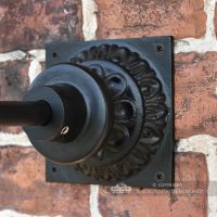 Detailed image of ornate wall mounting plate