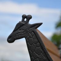 Close up of Giraffe detailing on bench 