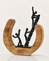 The liberation cast aluminium and mango wood sculpture
