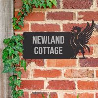 Liver Bird Iron House Name Sign in Use on a Brick Wall