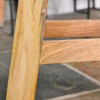 Close-up of the Mango Wood Legs on the Stool