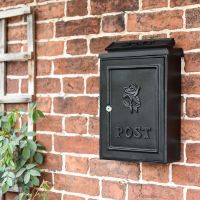 Black Wall Mounted Post Box in Situ on the Wall 