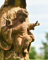 Close up of baby detail on garden statue