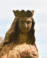 Close up of mother face detail on garden statue