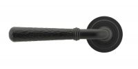 Matte Black Hammered Lever Door Handle on Art Deco Rose Front