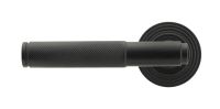 Matte Black Textured Lever Door Handle on Beehive Rose Front