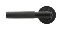 Matte Black Textured Lever Door Handle on Rose Front