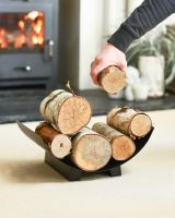 Scale Shot Of "Media Luna" Contemporary Log Holder