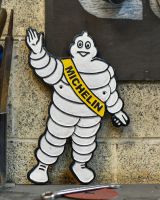 Cast Iron "Michelin Man" Sign