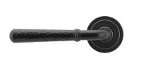 Midnight Black Hammered Unsprung Lever Door Handle on Art Deco Rose Front