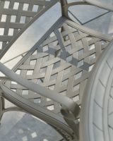 Close up of the curved lattice pattern on the seat