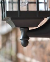 Modern Caged Cube Wall Light bottom finial close up