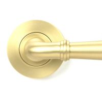 Close-Up of Modern Satin Brass "Neville" Unsprung Door Handle on Rose Set - 53mm