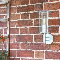 "Naltio" Contemporary Silver Wall Light in Situ on the Front of a house
