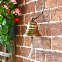 5" Antique Brass Bell with Rope Lanyard in Situ on a Brick Wall
