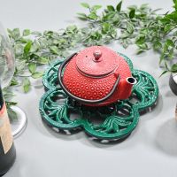 Cast Iron Flower Petal Trivet in Green in Use with Teapot
