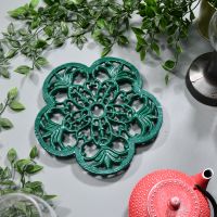 Cast Iron Flower Petal Trivet in Green in Situ with Teapot