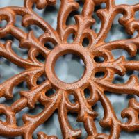 Rustic Cast Iron Flower Trivet Centre Close-Up