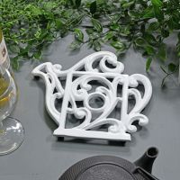 Cream Cast Iron Kettle Trivet in Situ