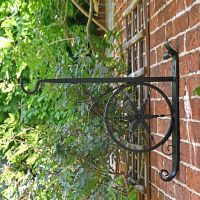 Side View of the "Northern Star" Hanging Basket Bracket Mounted on a Brick Wall