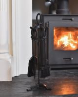 In situ photo of black traditional fireside companion set