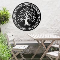 Round "Olive Tree" Wall Art in the Garden Above a Wooden Table and Chair Set