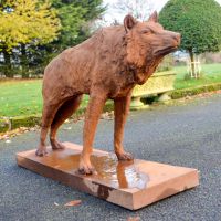 Cast Iron "Looking Forward" Wolf Sculpture Finished in a Rustic finish