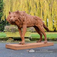 Rustic Cast Iron "Creeping" Wolf Sculpture in Situ in the Garden