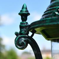 Ornate Finial On Antique Green Lamp Post