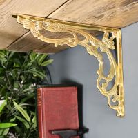  Ornate “Victorian Amalina” Scroll Bracket Polished Brass in Situ Holding Up a Wooden Shelf