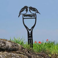 Pair of Robins Sheet Steel Silhouette in Black Finish in Situ