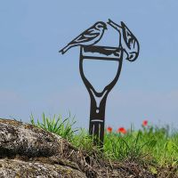 Pair of Siskins Sheet Steel Silhouette in Black Finish in Situ