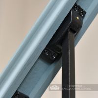 Rake bracket on stair spindle