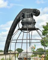 Close up of recycled metal grenade detail on public art sculpture