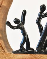 Close up of black figures in interior art sculpture