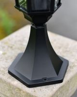 Close up of robust freestanding base on traditional lantern
