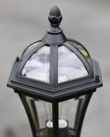 Close up of ornate detail on pillar lantern