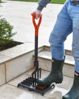 Scale Shot of Pitch Fork Boot Brush & Scraper with Red Handle