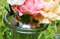 Close up of lid on conical vase