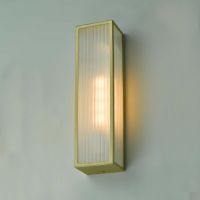 Polished Brass Reeded Glass Wall Light in Situ on a GReen Wall