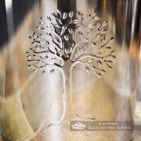 Close-up of the Embossed "Tree of Life" Symbol