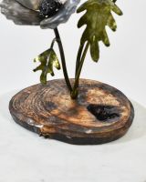 Close up of The Lone Poppy Sculpture base