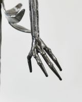Close up of The Pumpkin King Sculpture lower hand
