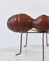 Close up of body on recycled metal ant